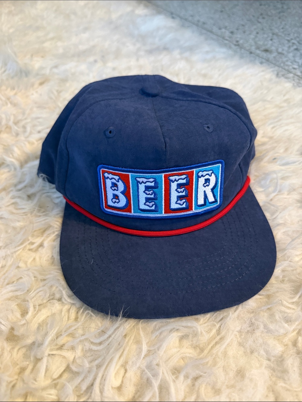 Navy 'BEER' Patch Snapback Hat with Red Trim